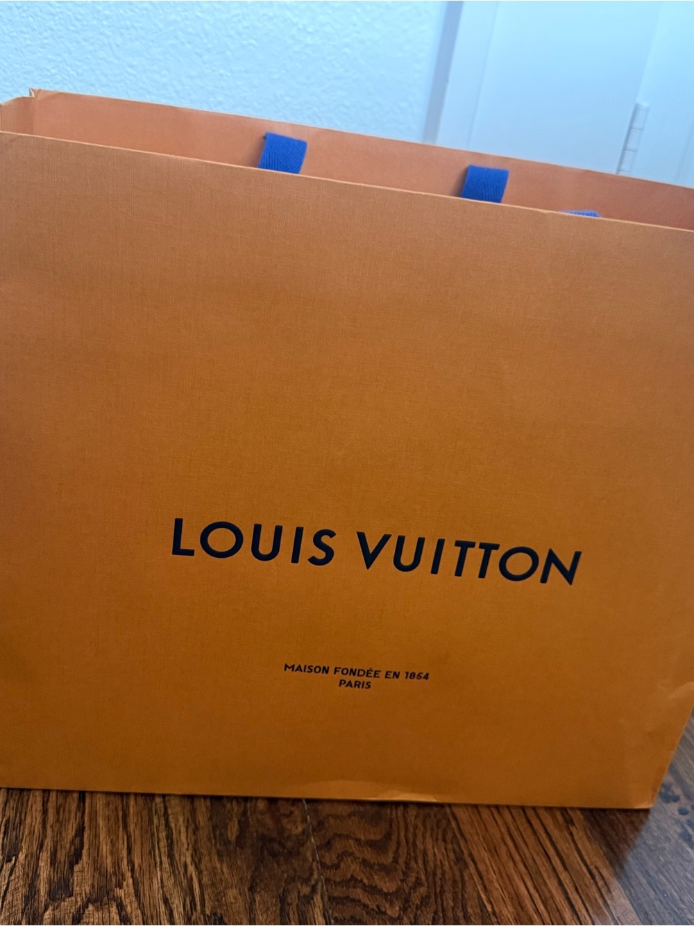 Louis Vuitton Orange Shopping Bag with Blue Handles